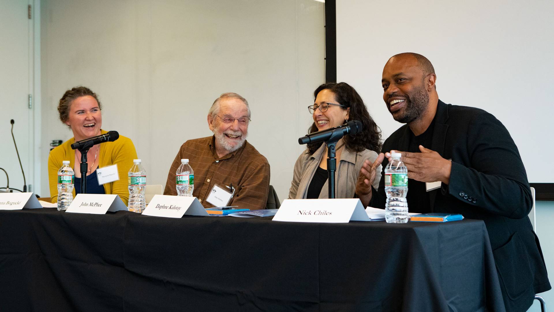 4 writers speak on a panel