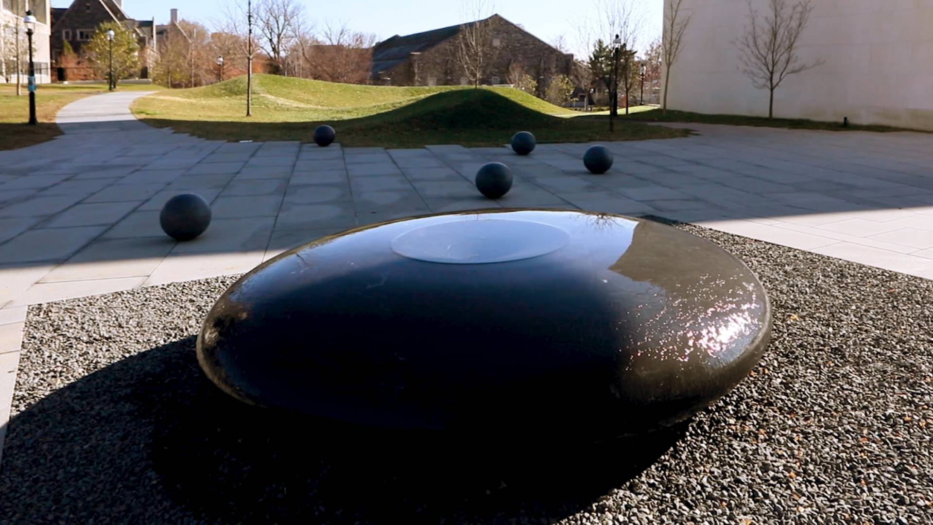 Maya Lin's environmental installation, consisting of water running over a dark, smooth oviod stone
