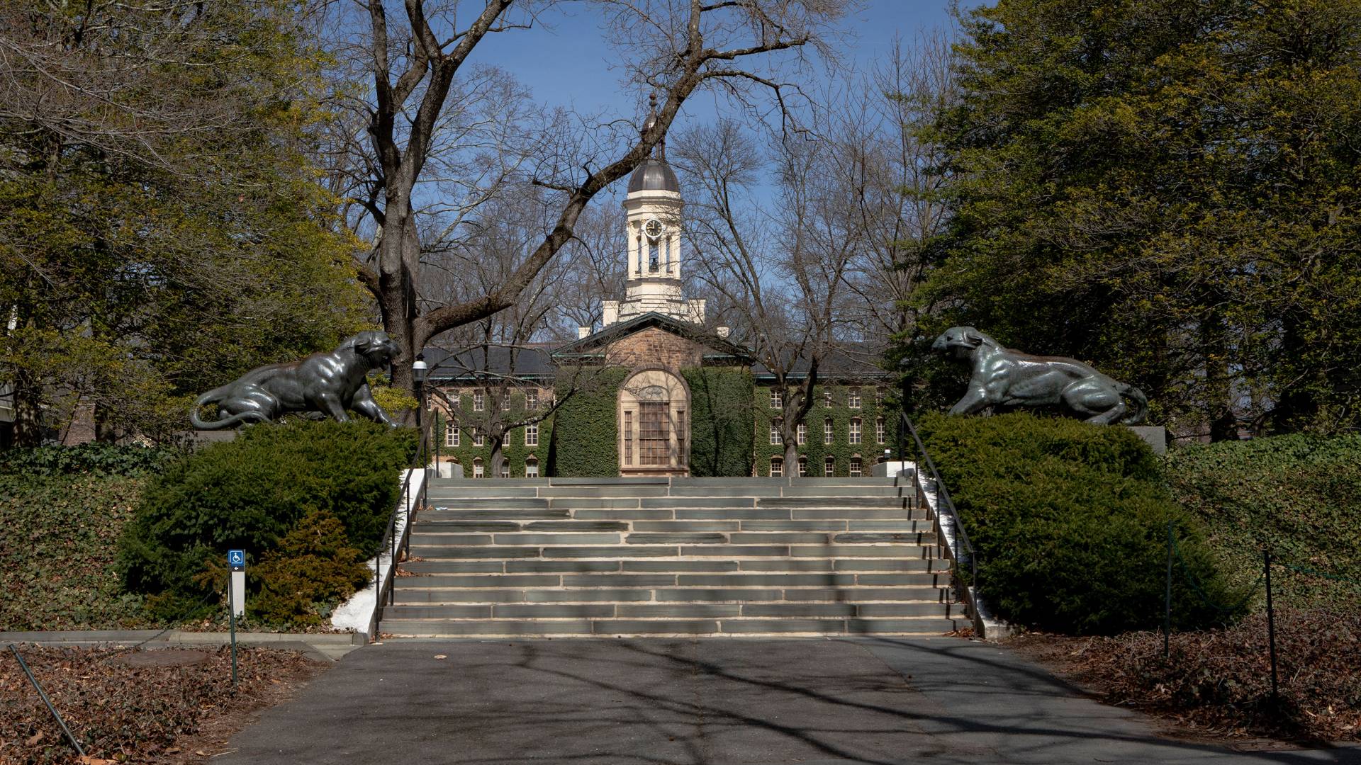 Nassau Hall with tigers in early spring
