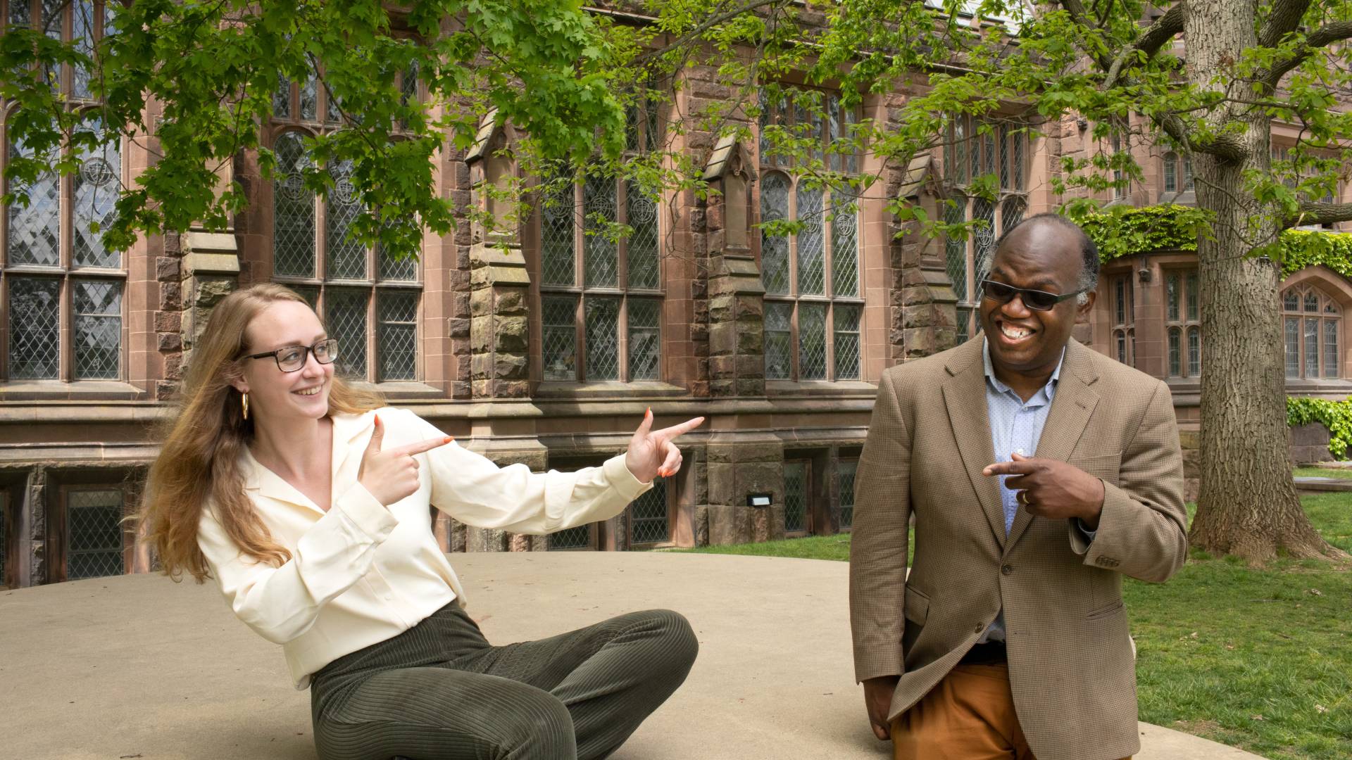 Treadway and her senior thesis adviser, Dan-el Padilla Peralta, an associate professor of classics and a 2006 Princeton graduate, share a light moment on campus.
