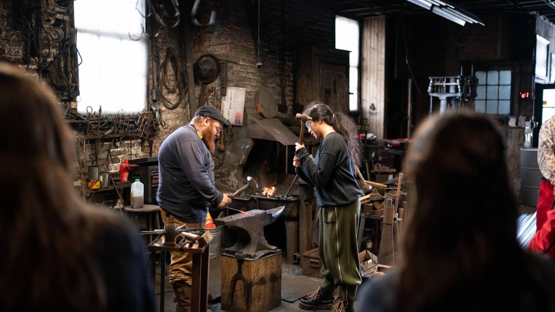 Students at a blacksmith