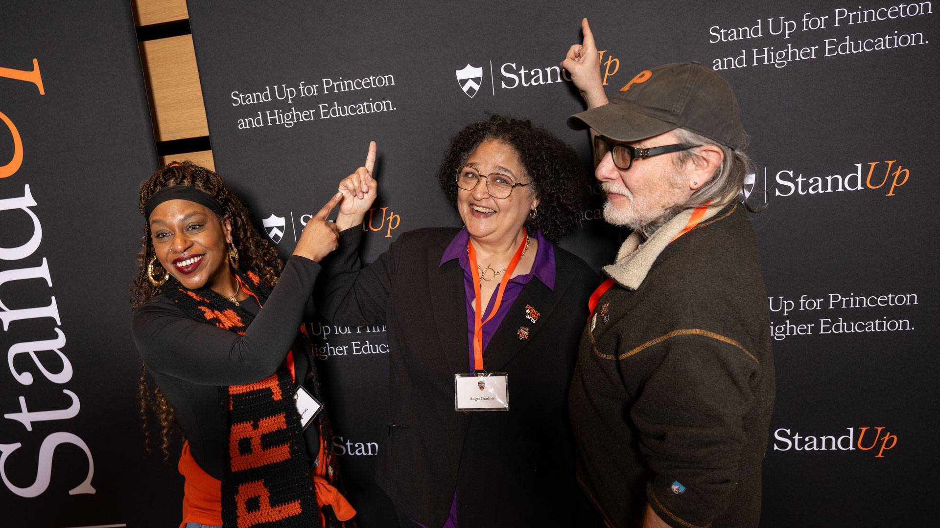 Princetonians near Stand Up banner 