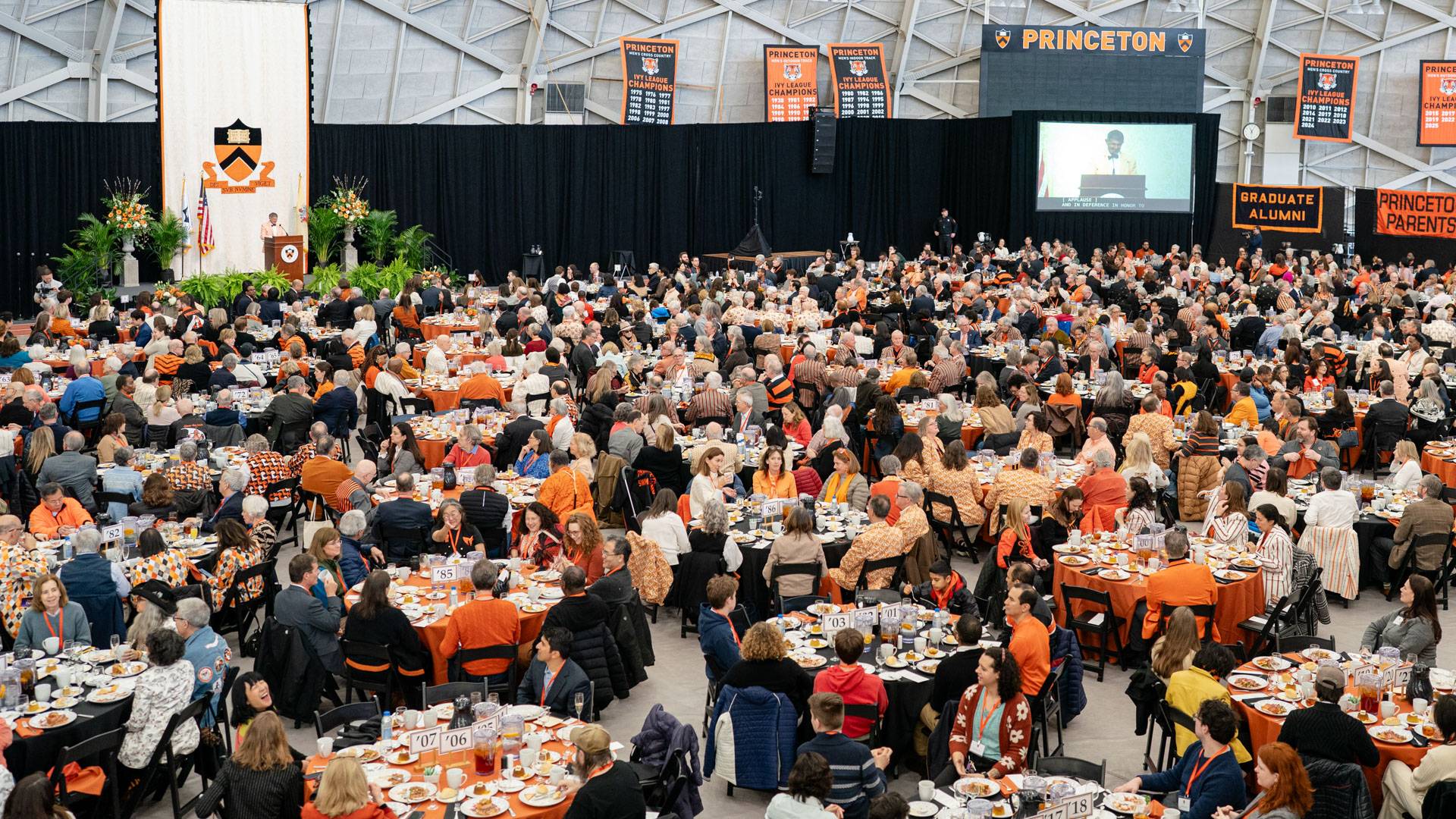 Alumni at lunch in Jadwin Gym. 