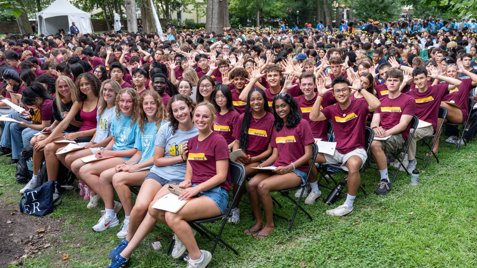 Students smile on Nassau Hall lawn