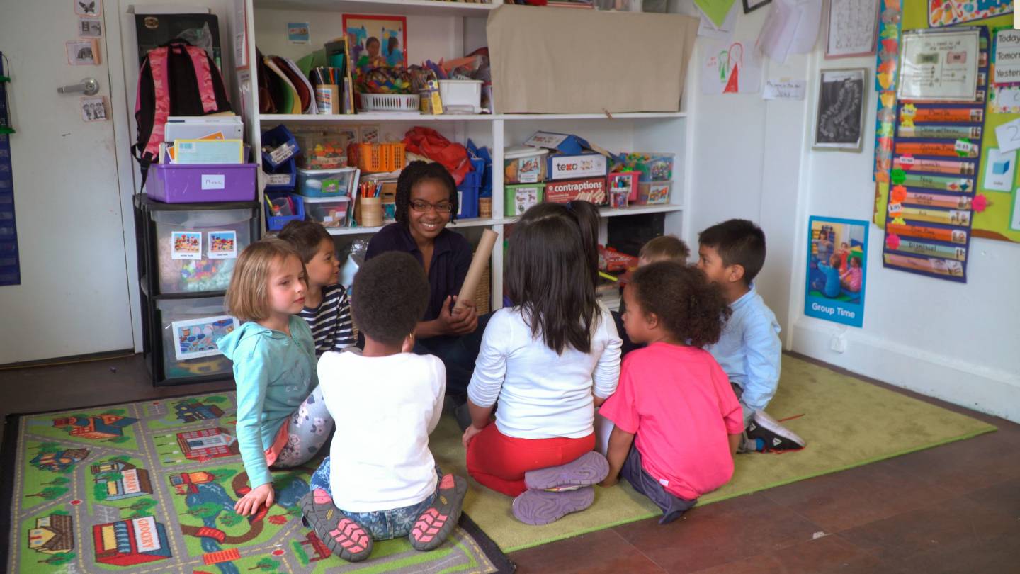 Jazmyn Blackburn teaching nursery school students