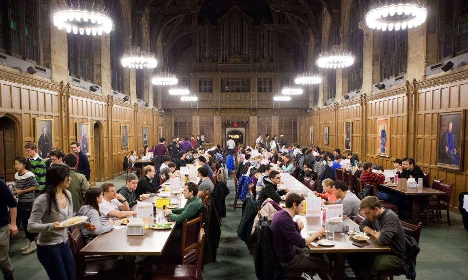 Students sitting down and dining at Procter Hall