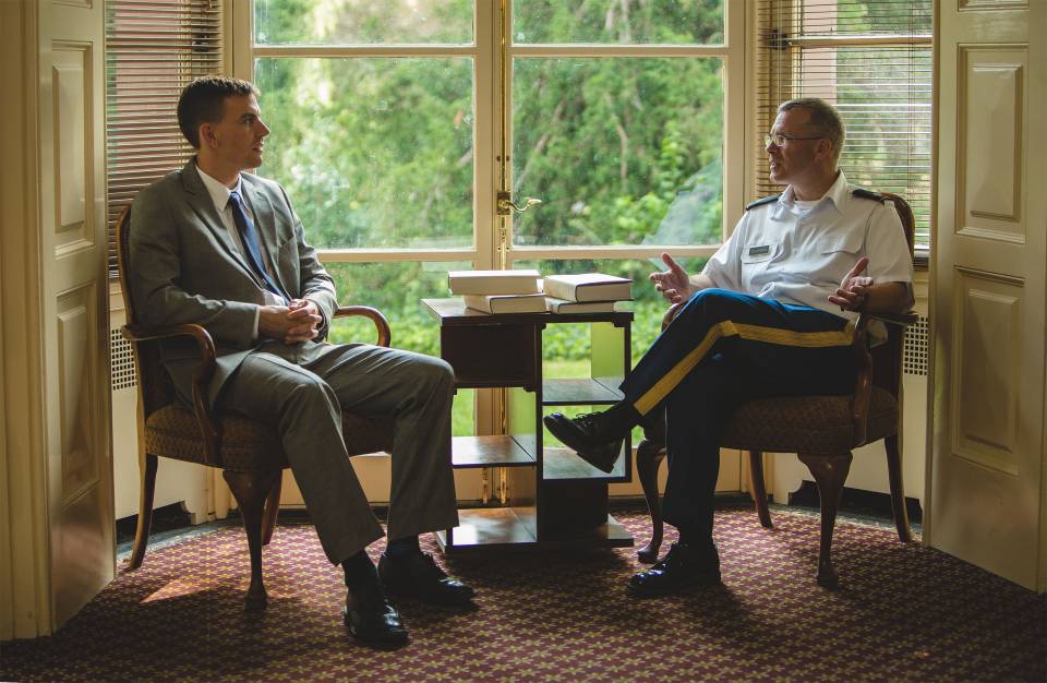 Jared Wigton, a Princeton graduate student in history on leave from the U.S. Army, chats with Lt. Col. Kevin McKiernan, director of the Army Officer Education Program in the Princeton Army ROTC program