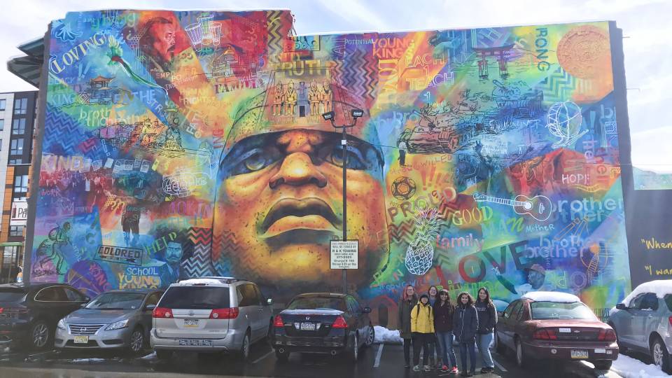 Students in front of mural in Philadelphia
