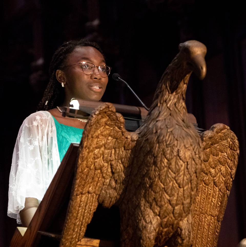 Katherine Powell at Chapel podium