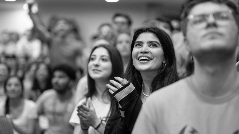 Students cheering in support of the Princeton basketball team