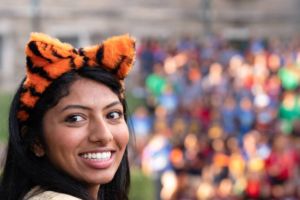 Student wearing Tiger ears smiles at Opening Exercises