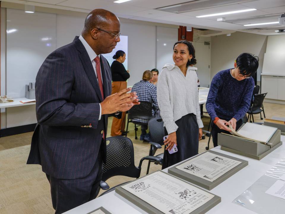 Dean of the Faculty Gene Jarrett (left), the William S. Tod Professor of English, works with undergraduate and graduate students to analyze some of the Black and African American literary artifacts housed at Princeton University Library's Department of Special Collections.