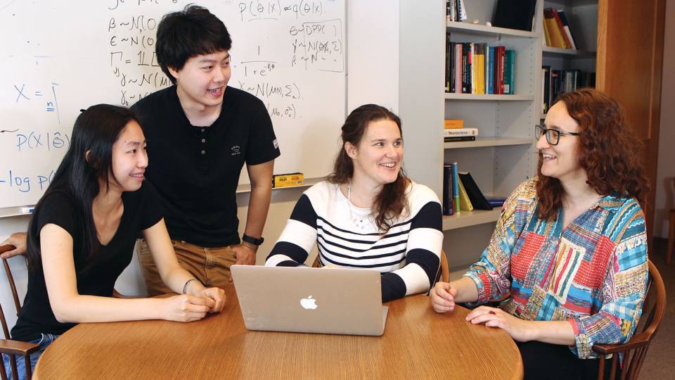 Computer scientist Barbara Engelhardt (center) leads a research group that is deciphering gene-expression data