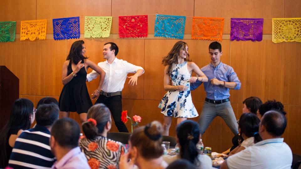 Students perform a dance routine at the LatinX graduation ceremony.