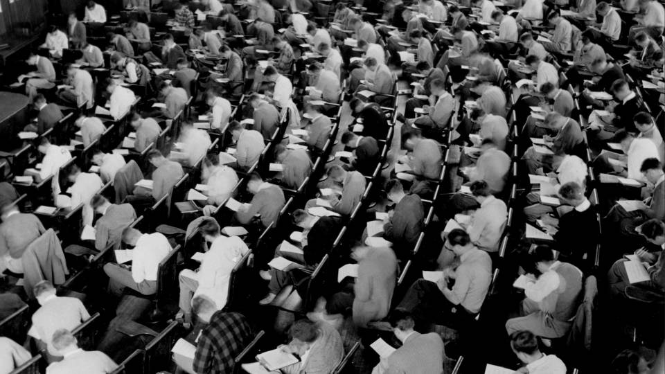 Students taking an exam in Princeton University’s McCosh Hall. circa 1950s