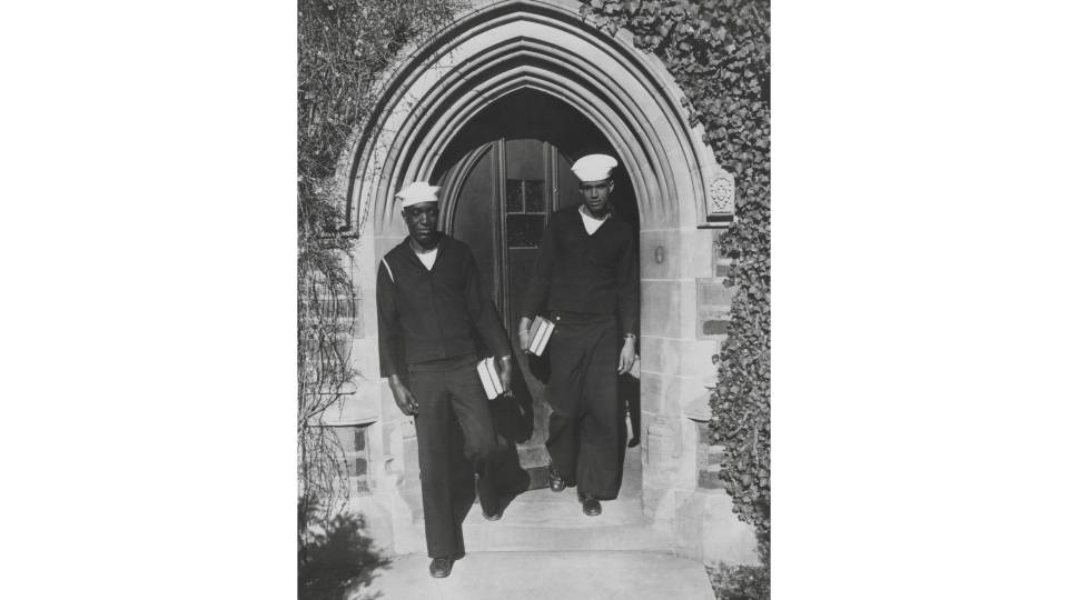 James Ward (1948) and Arthur Wilson (1948) coming out of entrance to Laughlin Hall.