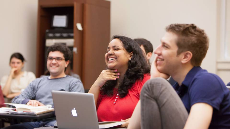 students laughing in class