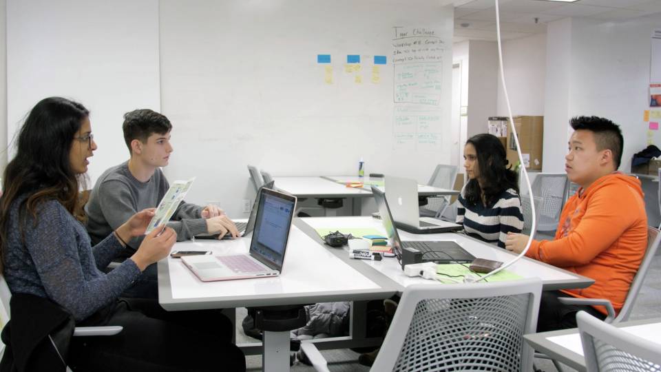 Students in the Tiger Challenge program discuss their climate action plan