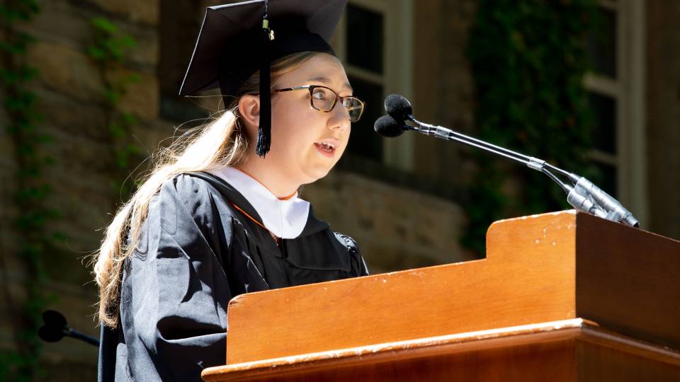 Valedictorian Kate Reed gives her address at the podium