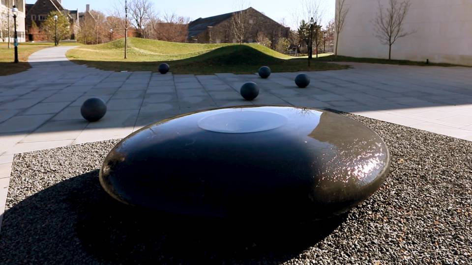 Maya Lin's environmental installation, consisting of water running over a dark, smooth oviod stone