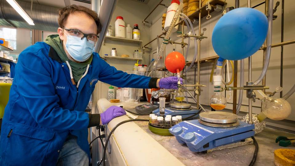 A postdoctoral student works in a chemistry lab
