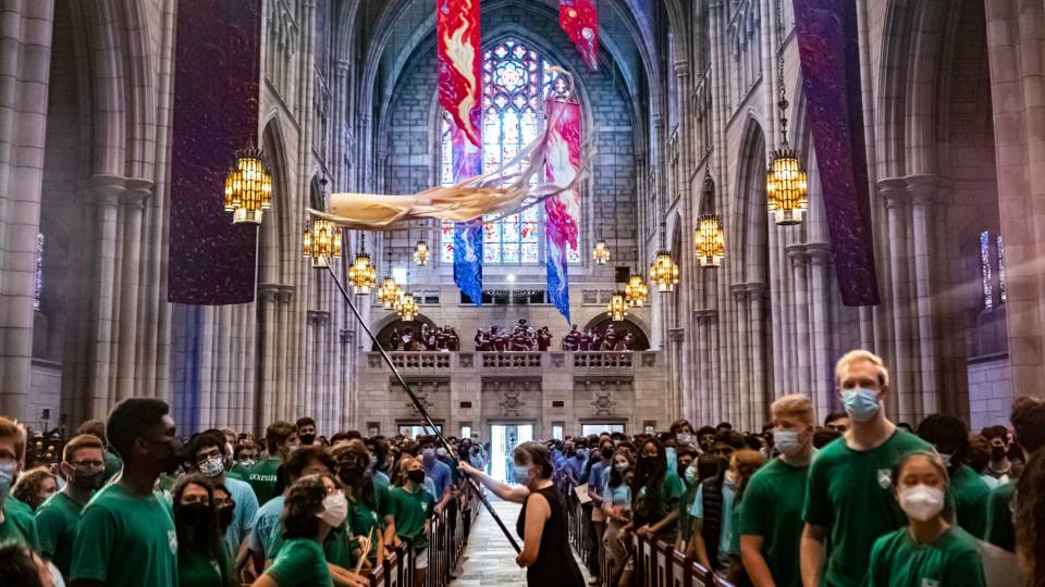Kites fly in the chapel during Opening Exercises 2021