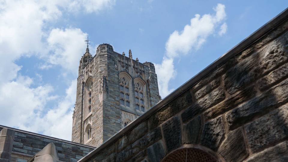 Firestone library on the Princeton campus framed by a blue sky