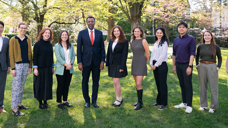 Graduate School Dean Rodney Priestley poses with the honorees.