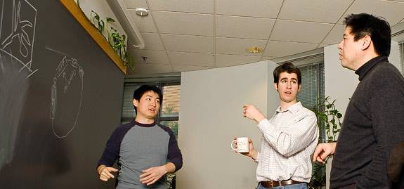 Sam Wang at the chalkboard