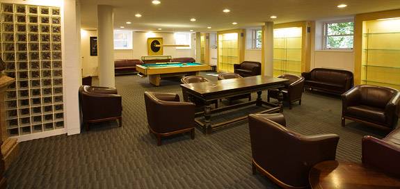 lounge with ducting hidden in shelving