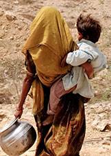 woman and child in Kachra Kundi