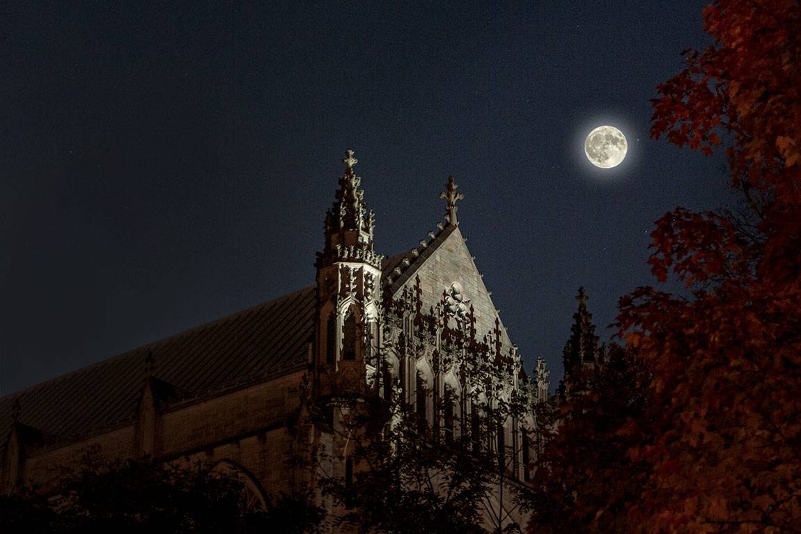 Happy Halloween moon over the chapel