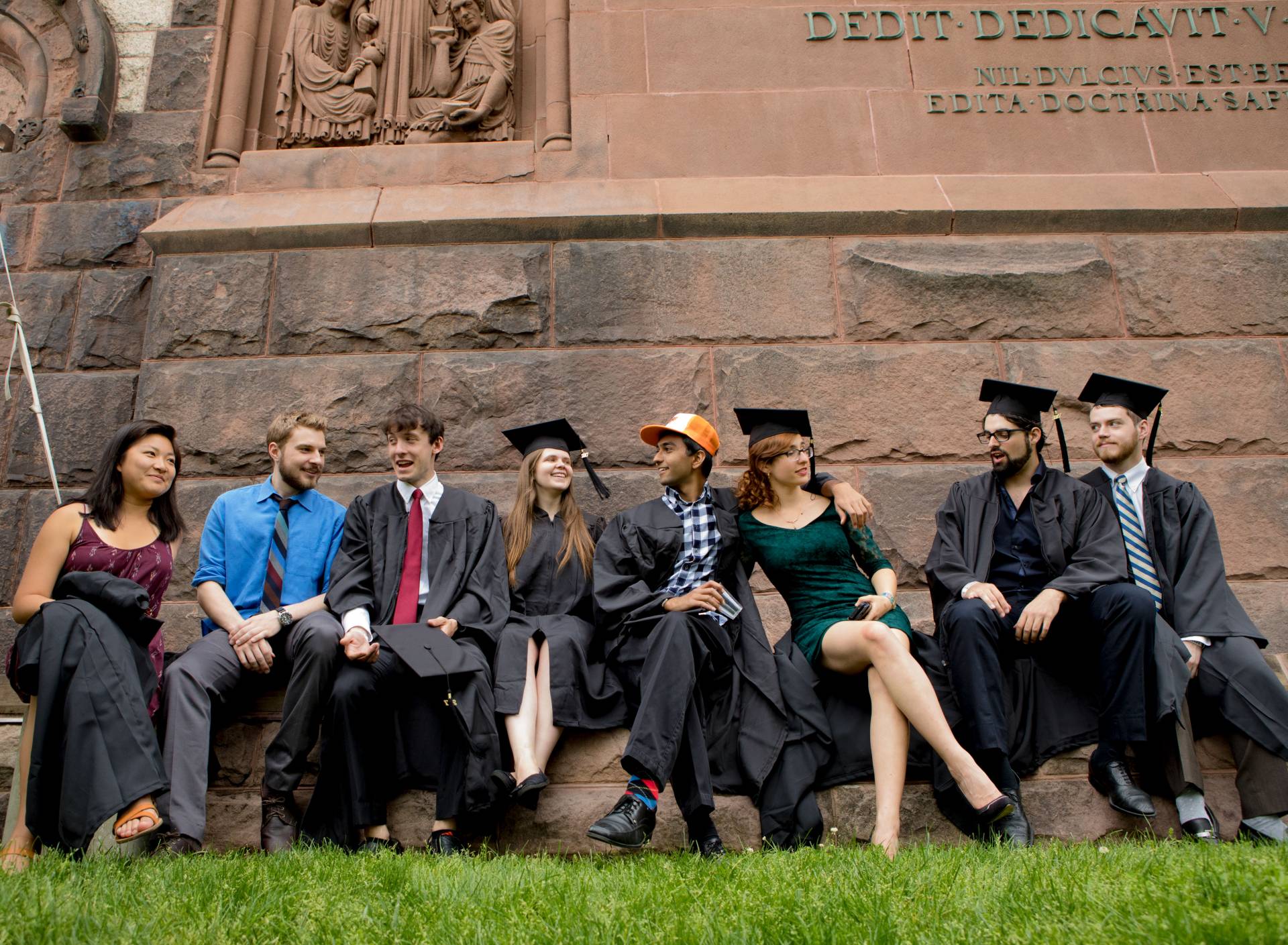 Friends sitting outside Alexander Hall before Baccalaureate 2017 procession