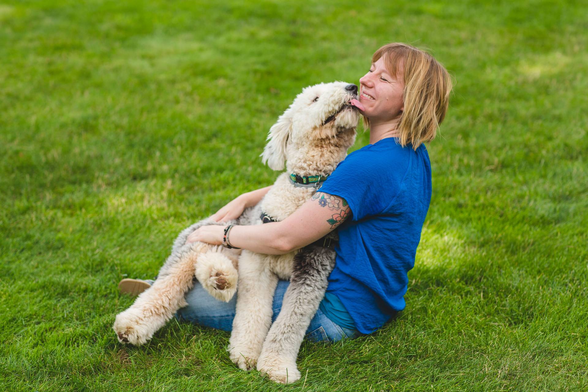 Bridgett vonHoldt sitting with her dog on her lap