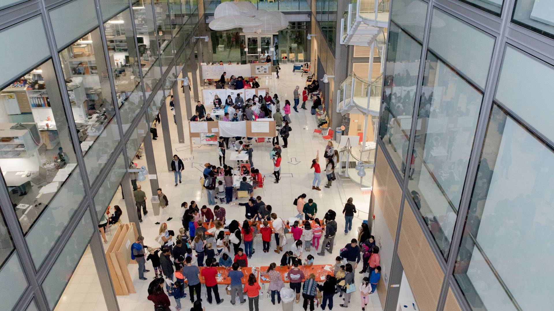 Crowd in chemistry building lobby during Chemistry Rocks event