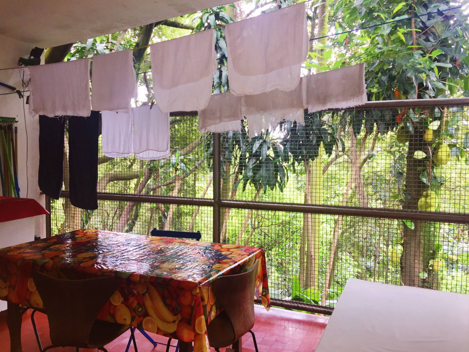Laundry hanging in dining room
