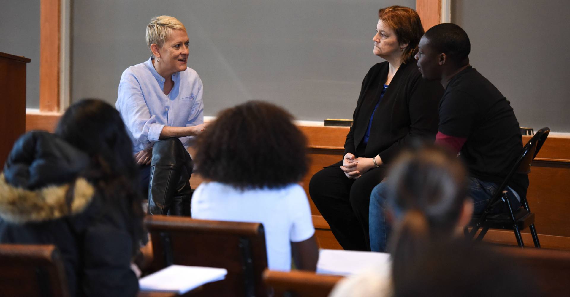 Kathryn Edin speaking with Lorie McDonough and Donnell Clark during class