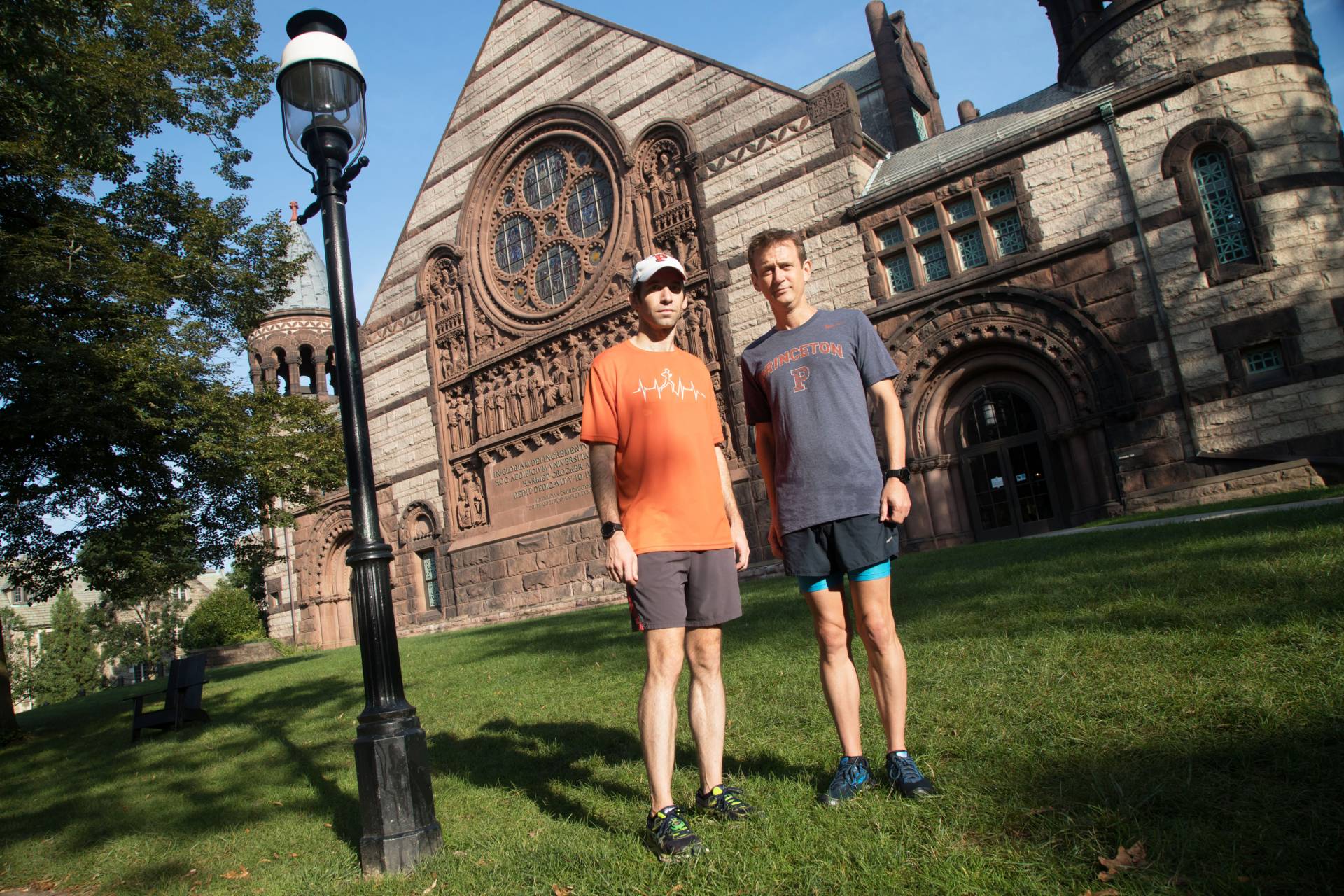 Nick Feamster stands to the left of Nolan McCarty outside