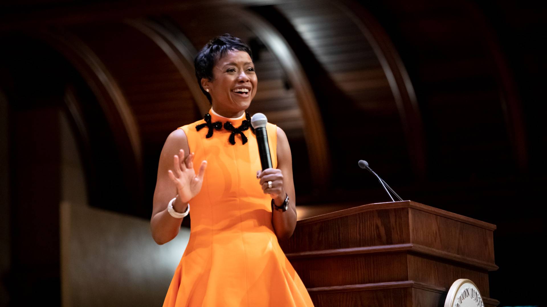 Mellody Hobson holding microphone