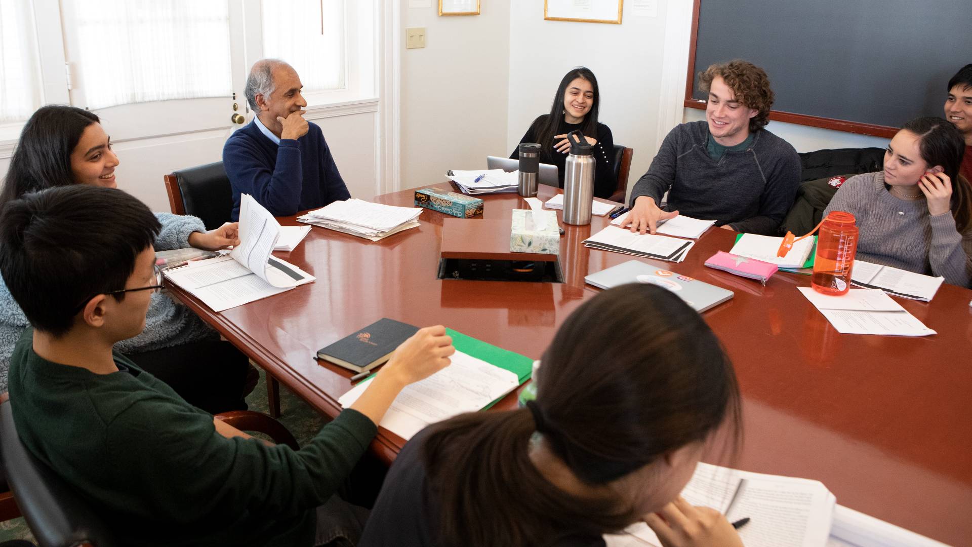 Pico Iyer listening to students during class
