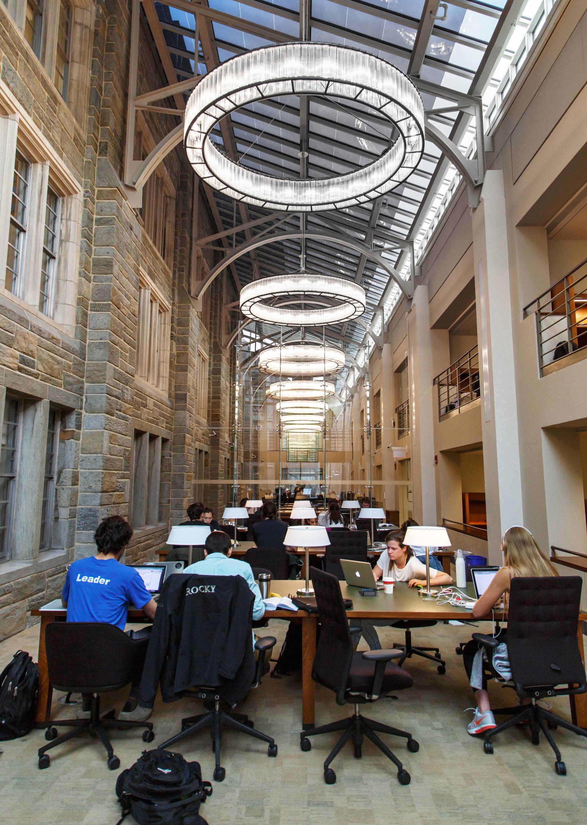 Students studying in library room