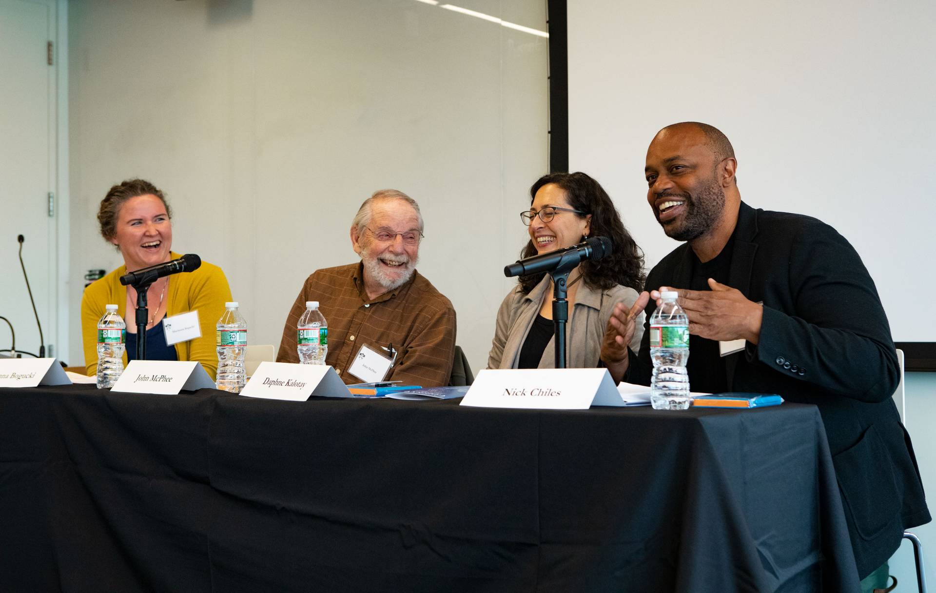 4 writers speak on a panel