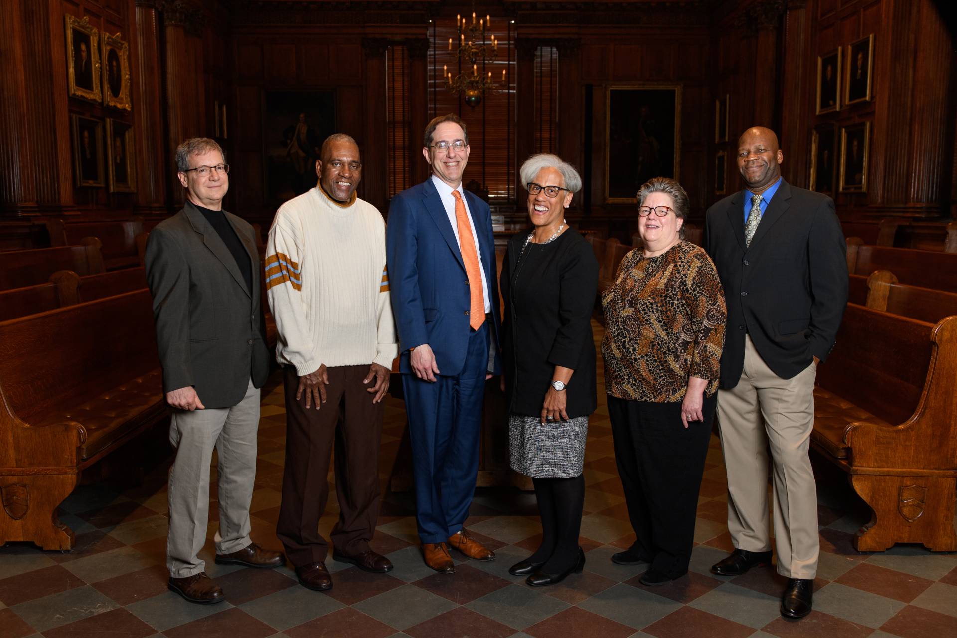 President Eisgruber poses with outstanding staff members honored for their service