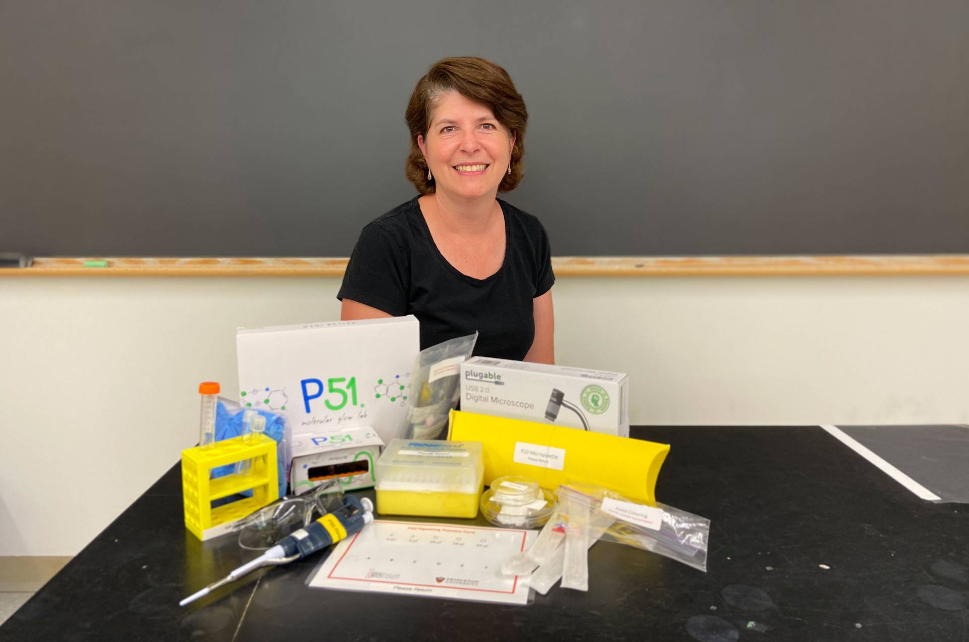 Heather Thieringer poses with science equipment