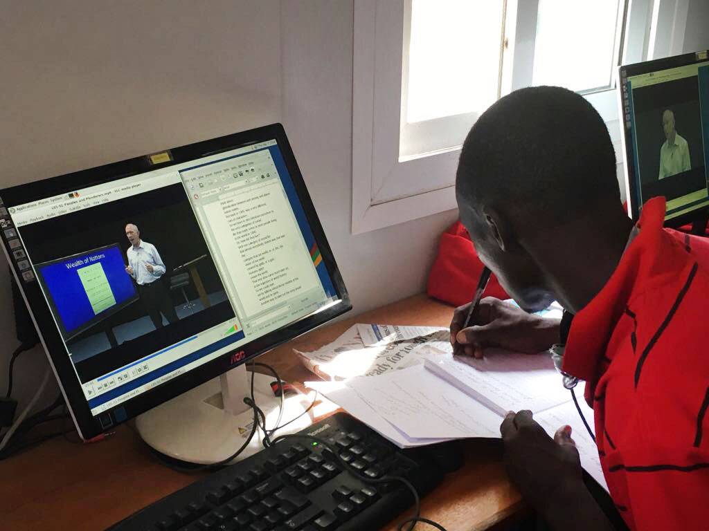 A student watches Professor Adelman's online class