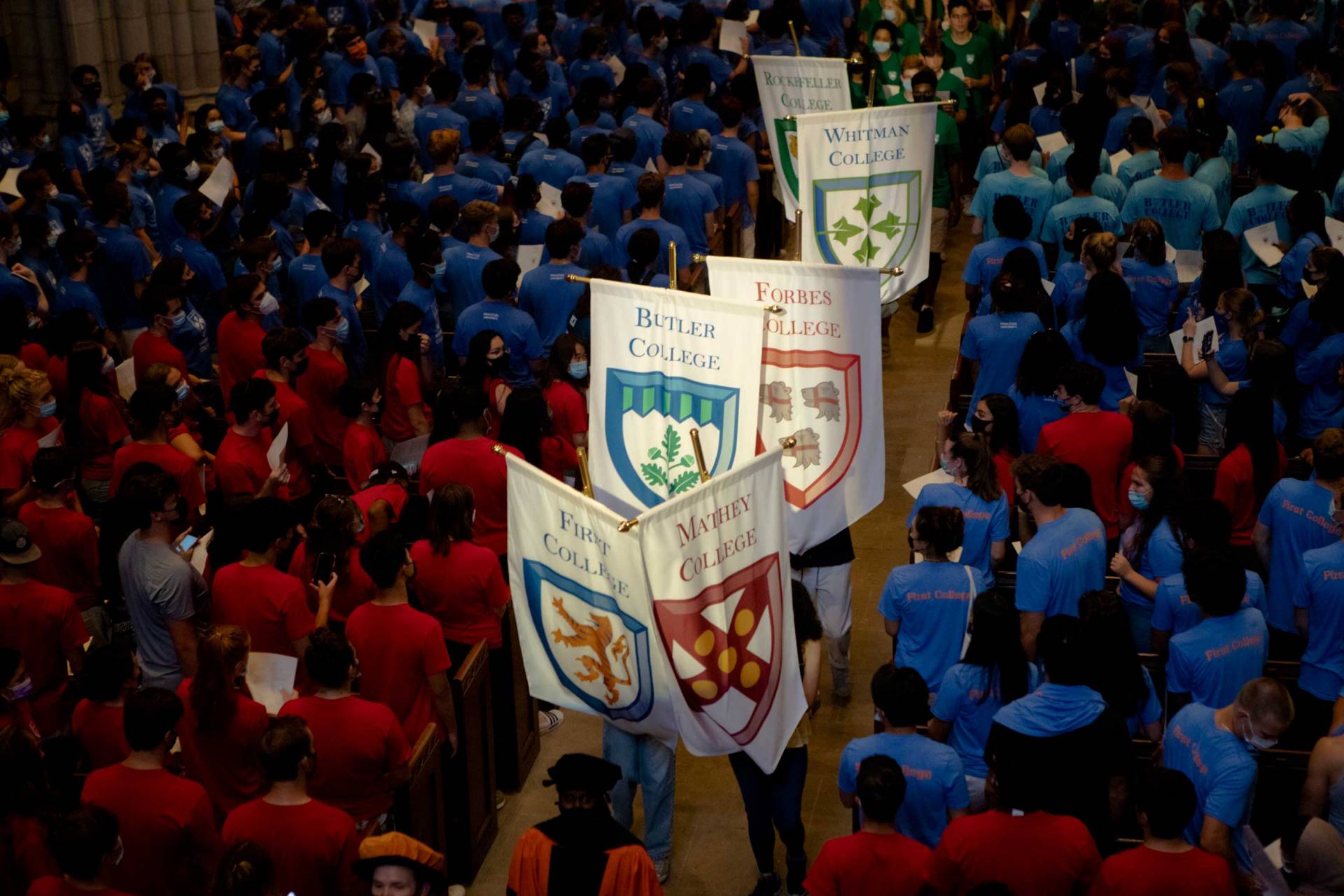 College banners come into the chapel