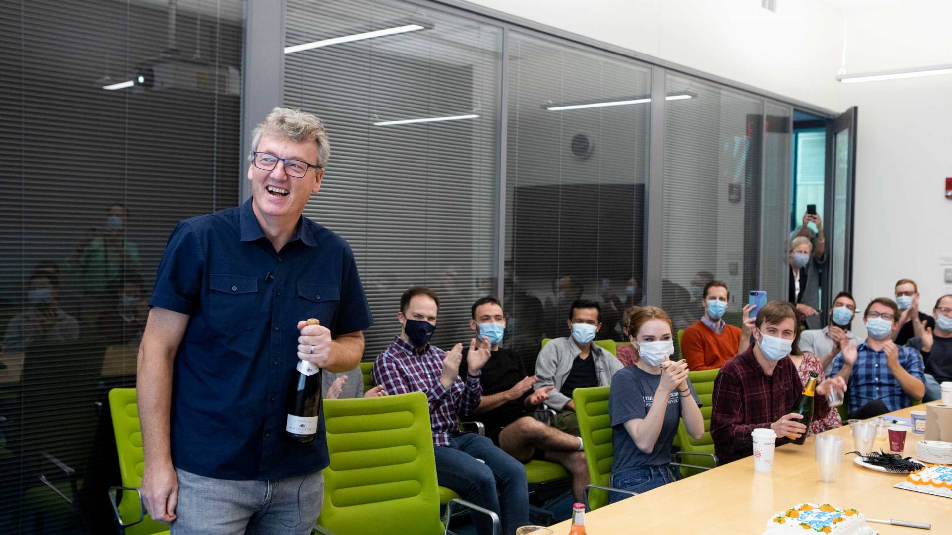 David MacMillan celebrates at his 9 a.m. meeting with his lab