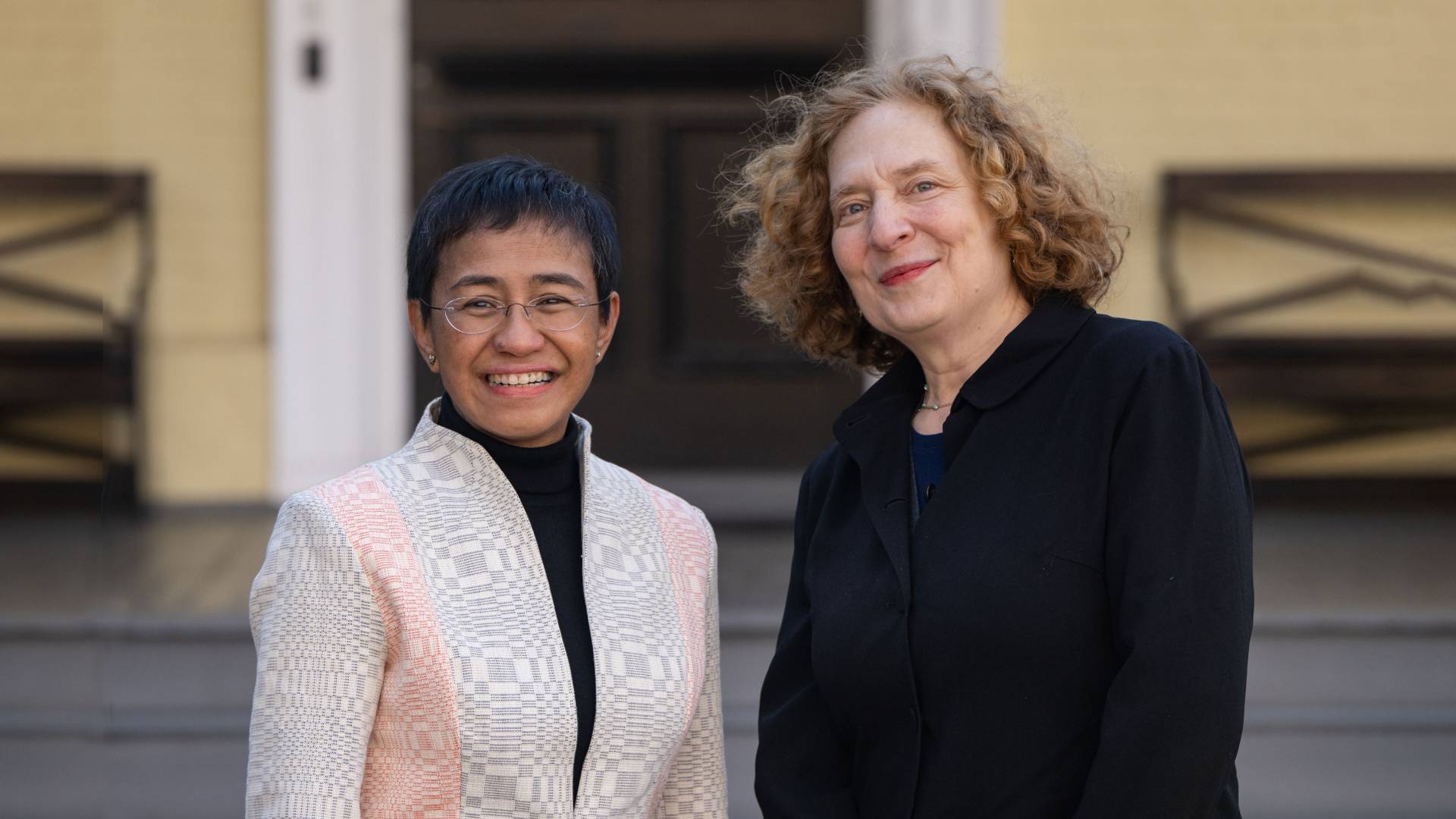 Maria Ressa and Julia Wolfe in front of MacLean House