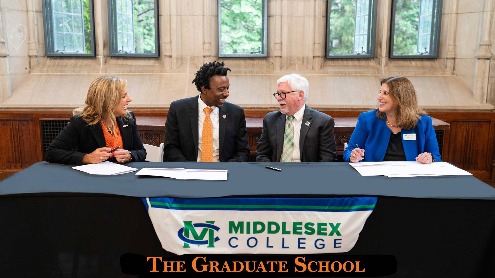 Signing ceremony for Middlesex Community College joining the Community College Teaching Program