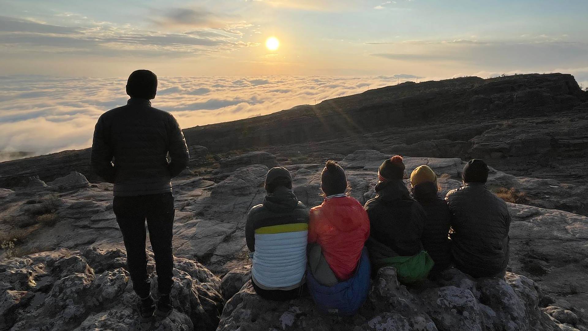 Students watch the sunrise in Bolivia